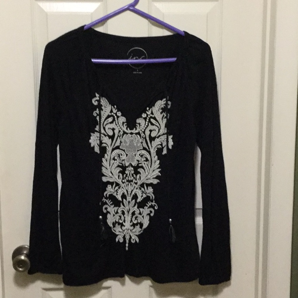 Black Top with decorative design on front